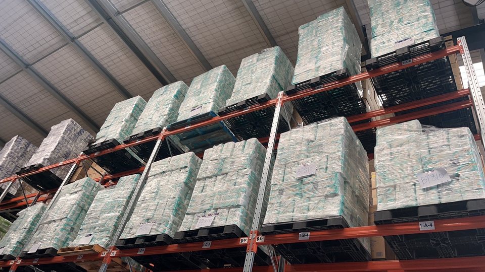 Pallets of tissue products on racking in One Nature's New Zealand warehouse